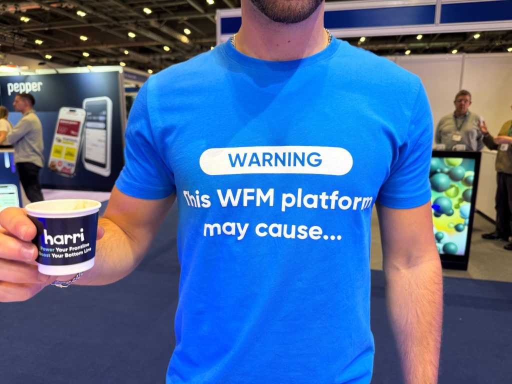 Blue T shirt that says: Warning - this WFM platform may cause...